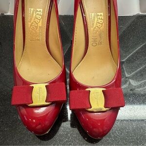 Salvatore Ferragamo Red Heels with Gold Bow Accent